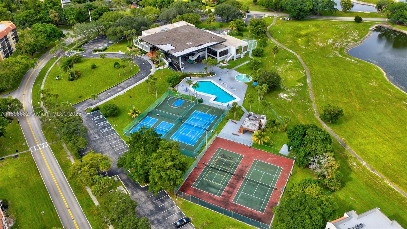 3821 Environ Boulevard, Unit 411 Lauderhill, FL 33319 - Photo 27 of 62 an aerial view of a house with a garden