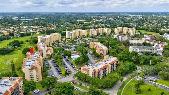 a view of a garden with a fountain