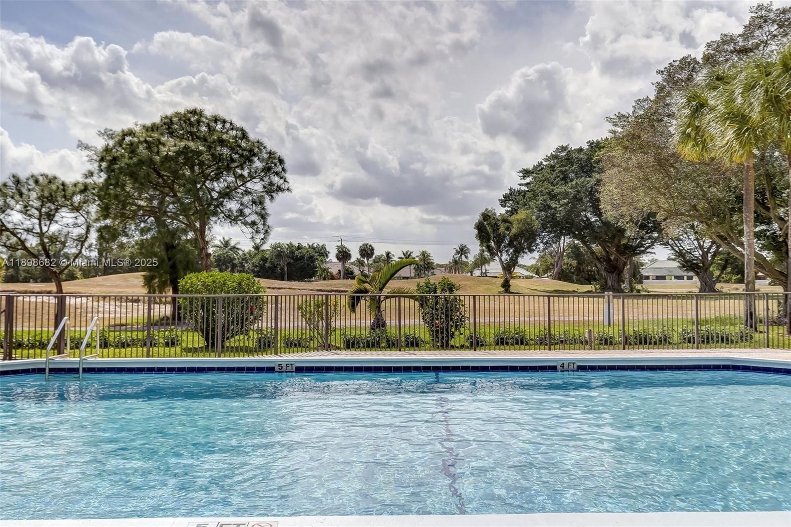 3821 Environ Boulevard, Unit 411 Lauderhill, FL 33319 - Photo 38 of 62 a view of a yard with large trees