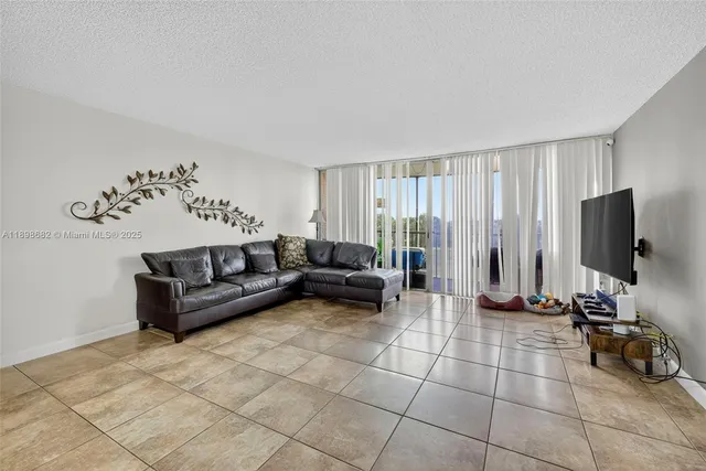 a view of a balcony with furniture