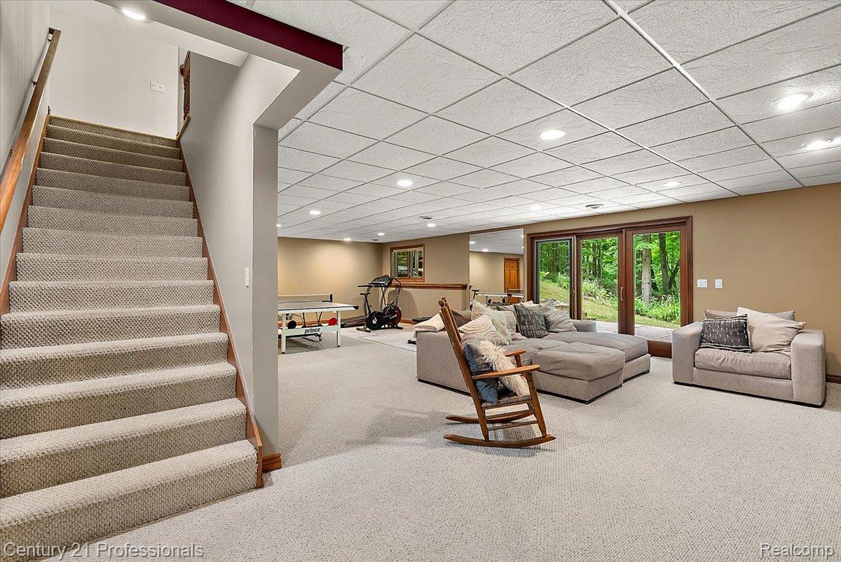 9867 Rainbow Ridge Drive Schoolcraft, MI 49087 - Photo 48 of 82 Spacious lower level featuring light-toned carpeting and a drop ceiling with recessed lighting
