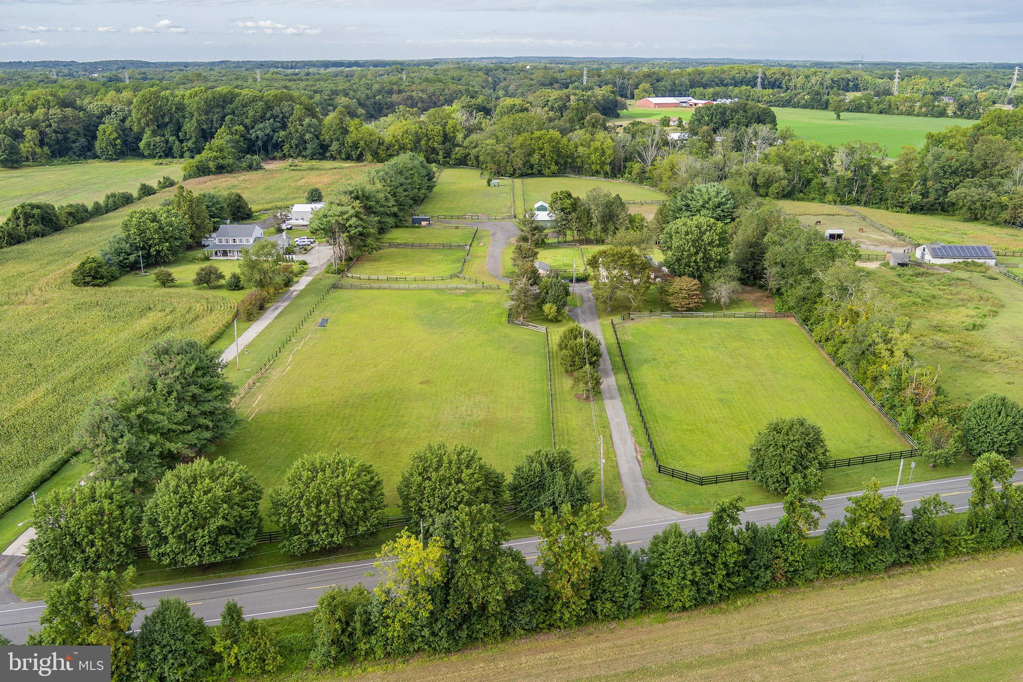 86 Bunting Bridge Road Cookstown, NJ 08511 - Photo 1 of 36 an aerial view of residential houses with outdoor space and swimming pool