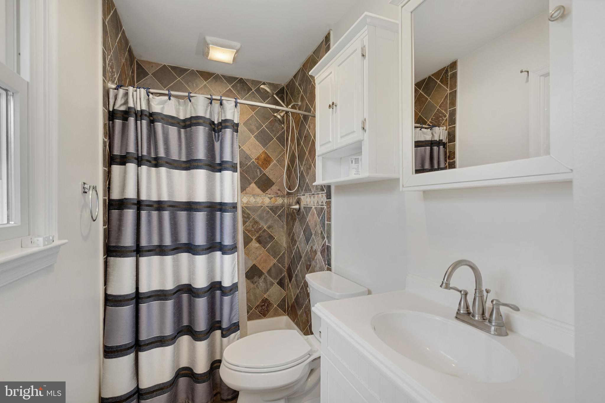 86 Bunting Bridge Road Cookstown, NJ 08511 - Photo 12 of 36 a bathroom with a sink toilet and shower