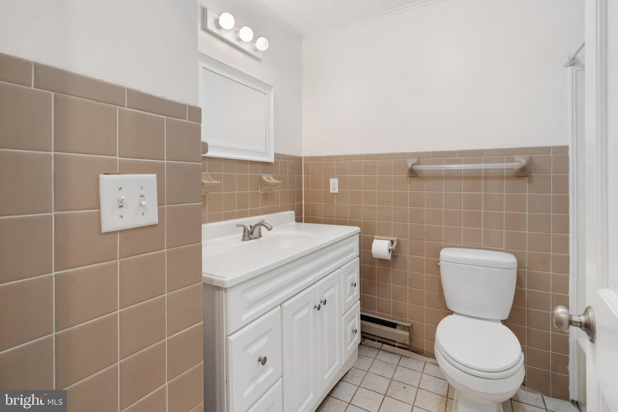 86 Bunting Bridge Road Cookstown, NJ 08511 - Photo 17 of 36 a bathroom with a toilet a sink and a mirror