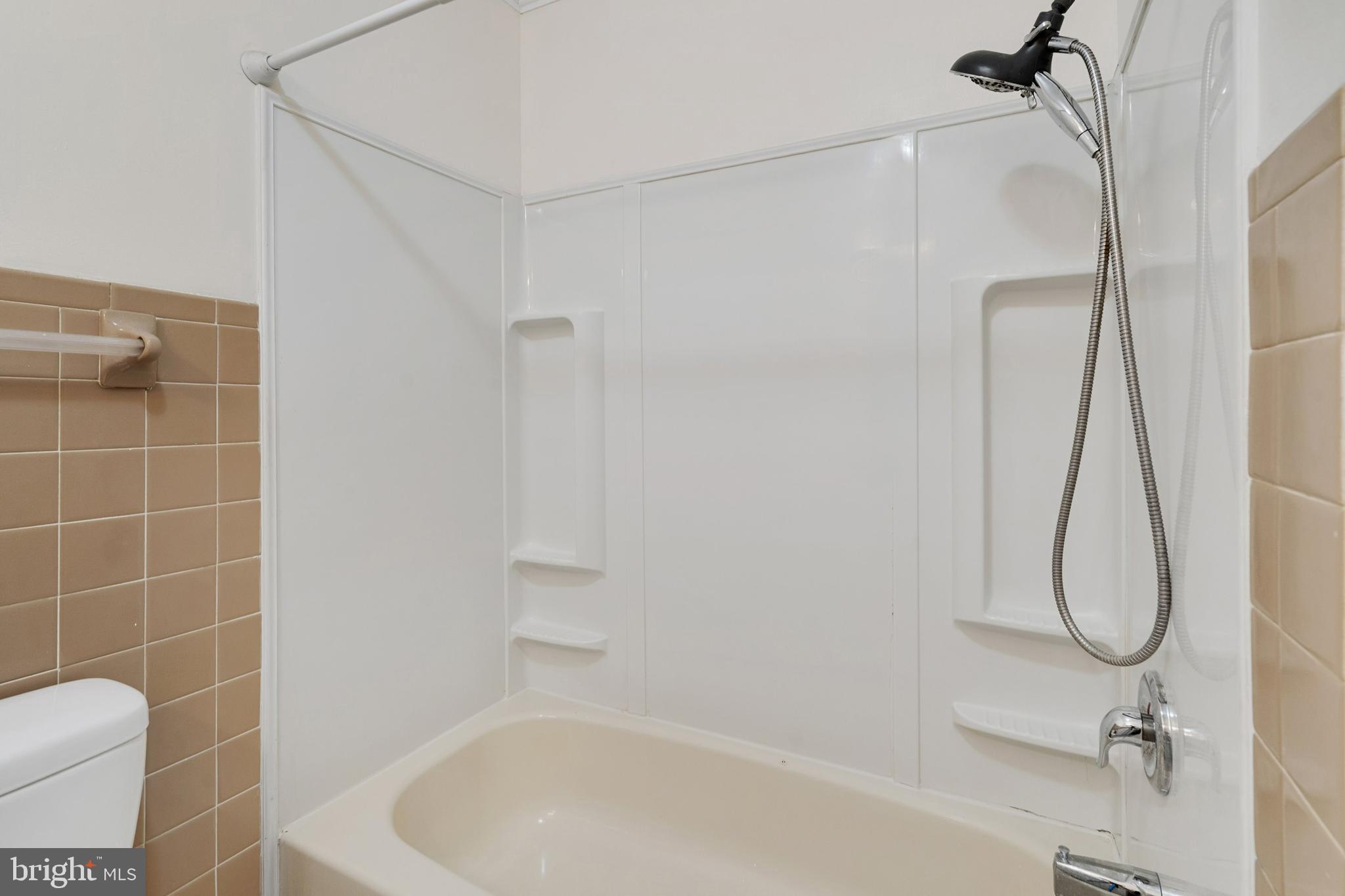 86 Bunting Bridge Road Cookstown, NJ 08511 - Photo 18 of 36 a bathroom with a bath tub with a shower