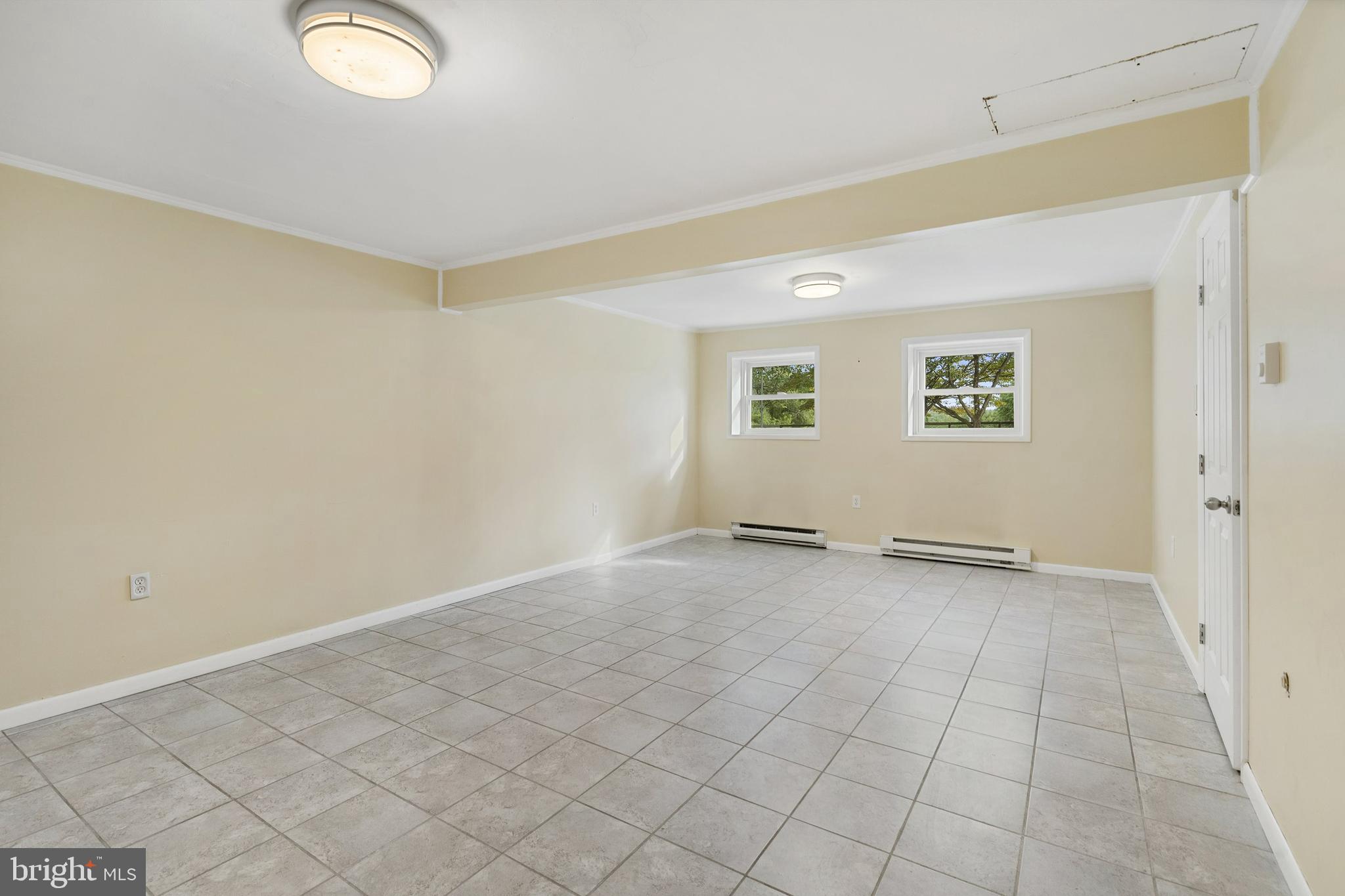 86 Bunting Bridge Road Cookstown, NJ 08511 - Photo 19 of 36 an empty room with windows