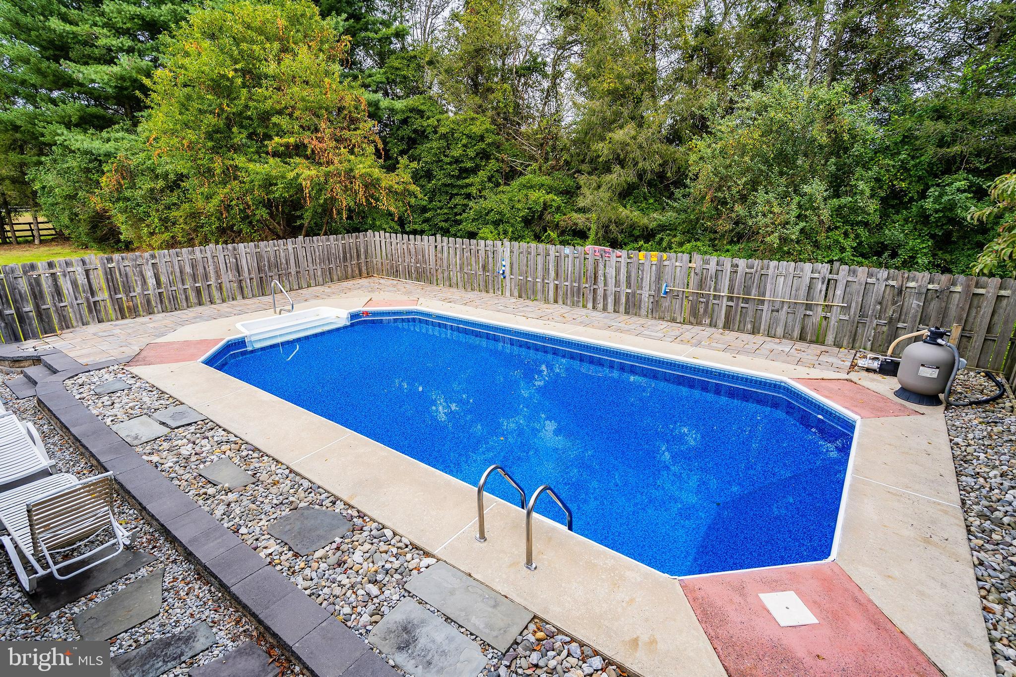86 Bunting Bridge Road Cookstown, NJ 08511 - Photo 22 of 36 a view of a wooden deck with a backyard