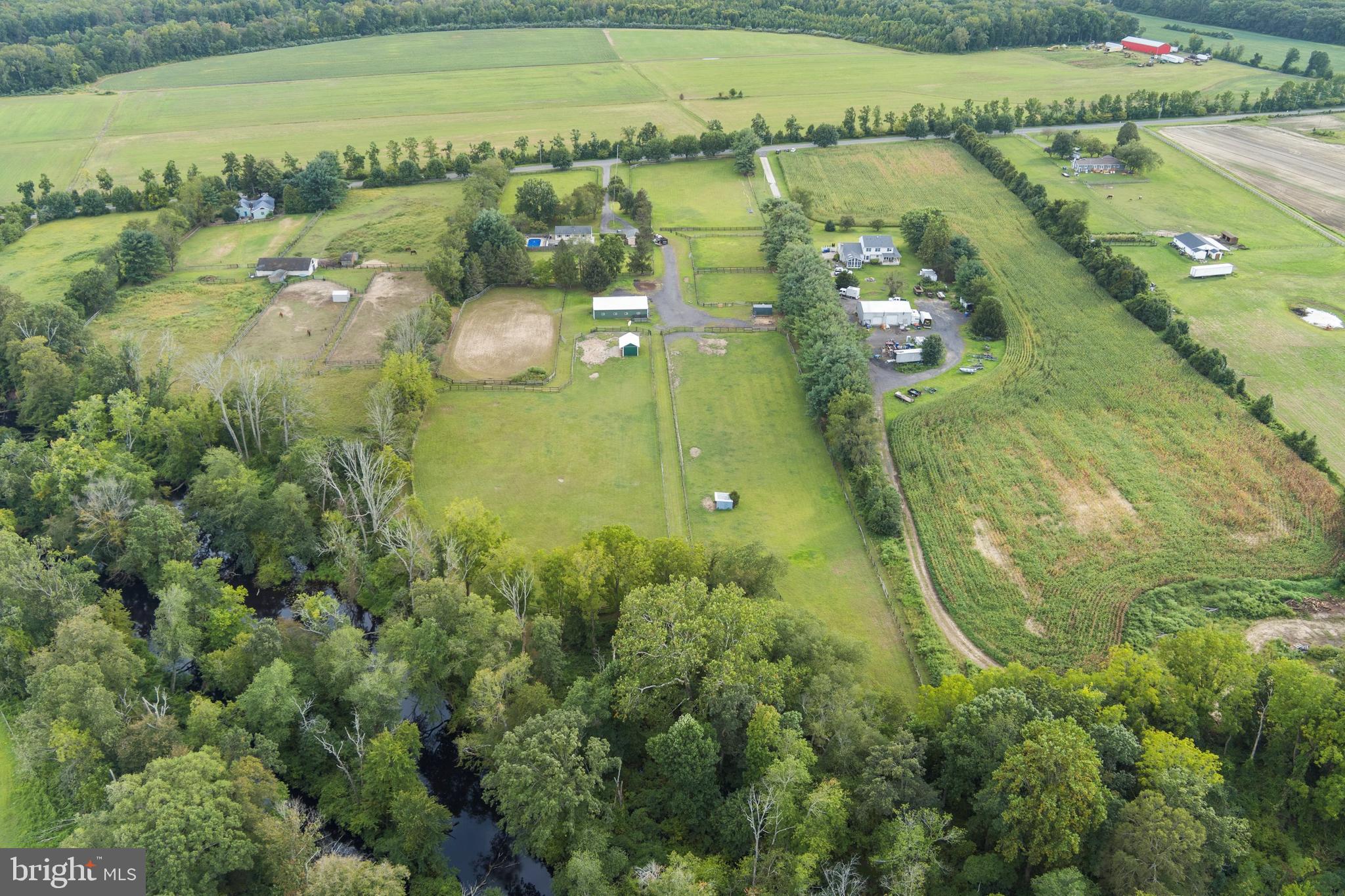 86 Bunting Bridge Road Cookstown, NJ 08511 - Photo 33 of 36 a view of a lake with a houses
