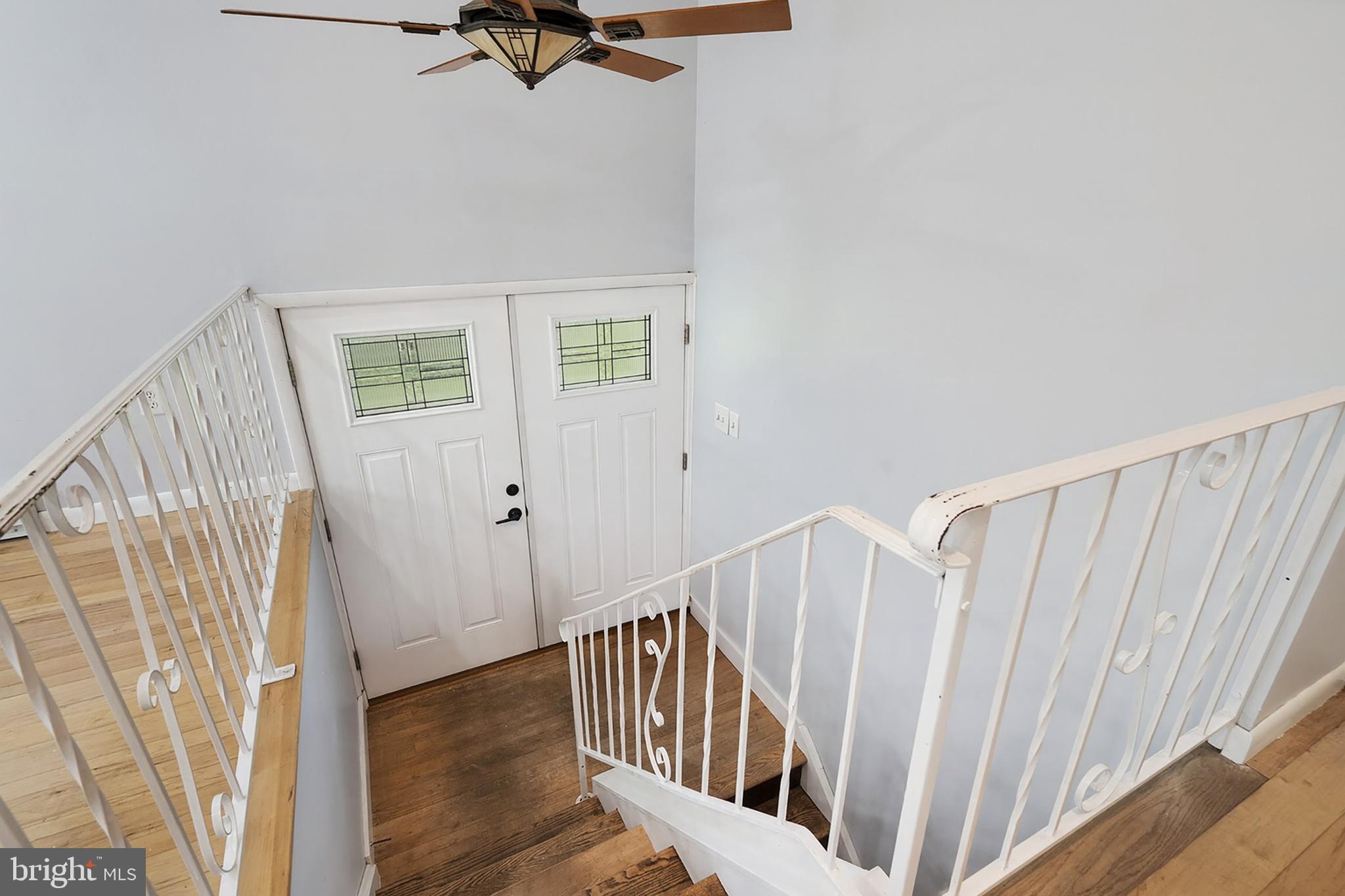 86 Bunting Bridge Road Cookstown, NJ 08511 - Photo 4 of 36 a view of a hallway with windows