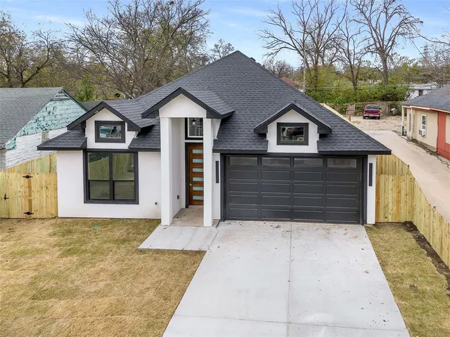 a house with trees in the background