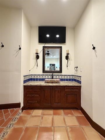 12410 Keith Road Beaumont, TX 77713 - Photo 28 of 45 a bathroom with a sink and a mirror