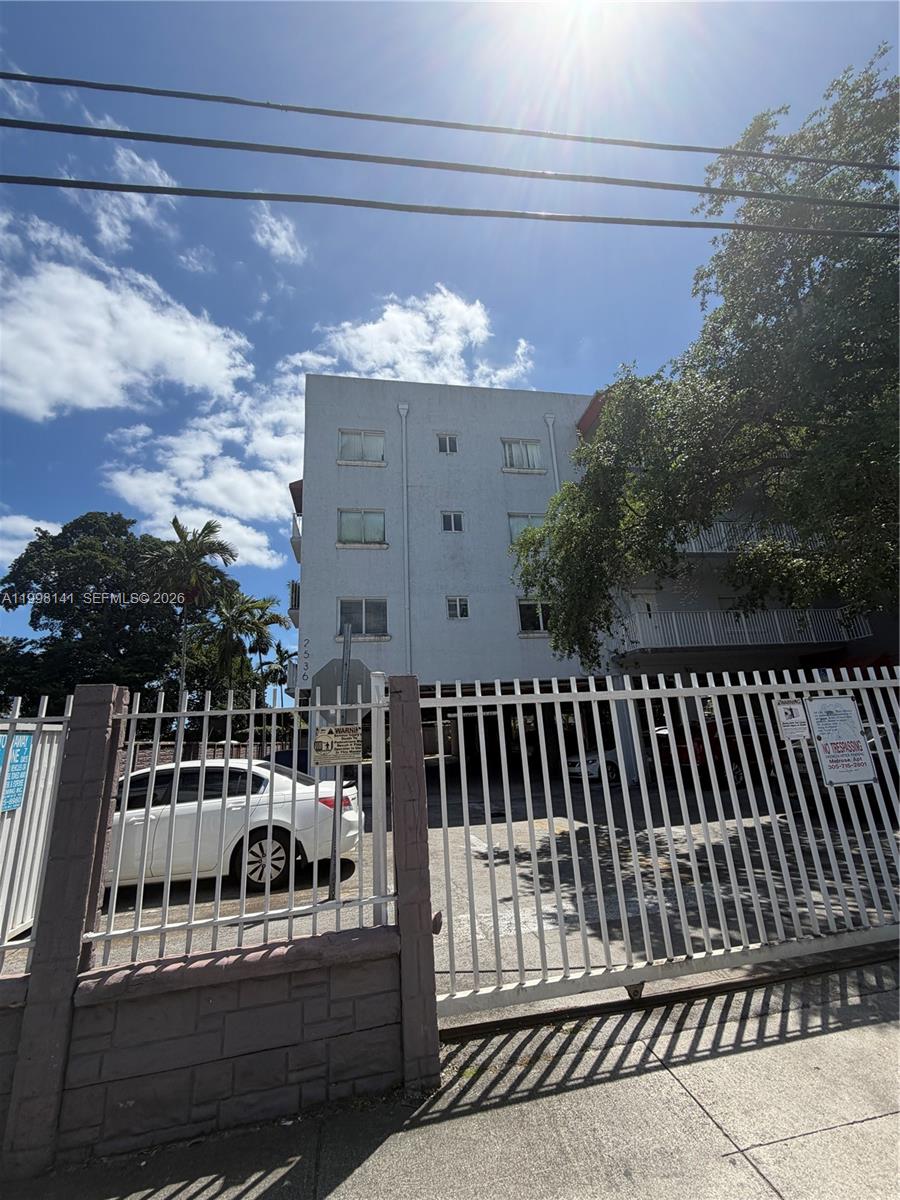 2536 Northwest 24th Street, Unit 3F Miami, FL 33142 - Photo 2 of 17 a view of a balcony with furniture