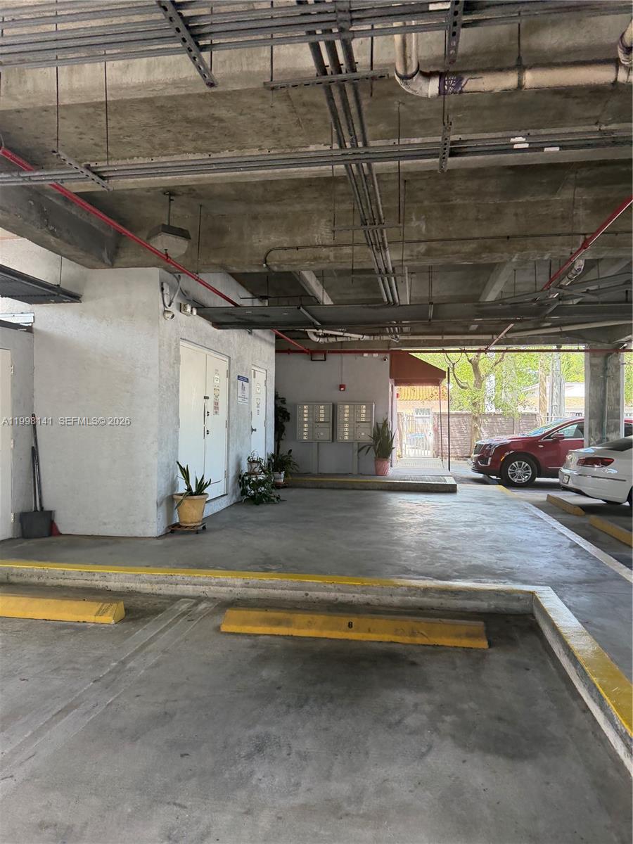 2536 Northwest 24th Street, Unit 3F Miami, FL 33142 - Photo 3 of 17 a view of parking garage