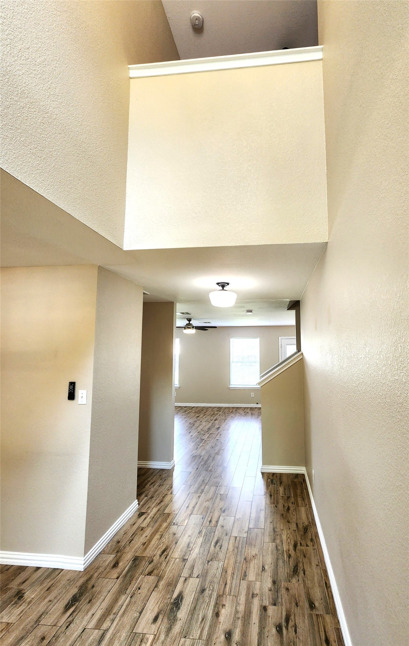 933 Meadow Ridge Loop Georgetown, TX 78626 - Photo 11 of 28 a view of empty room with wooden floor