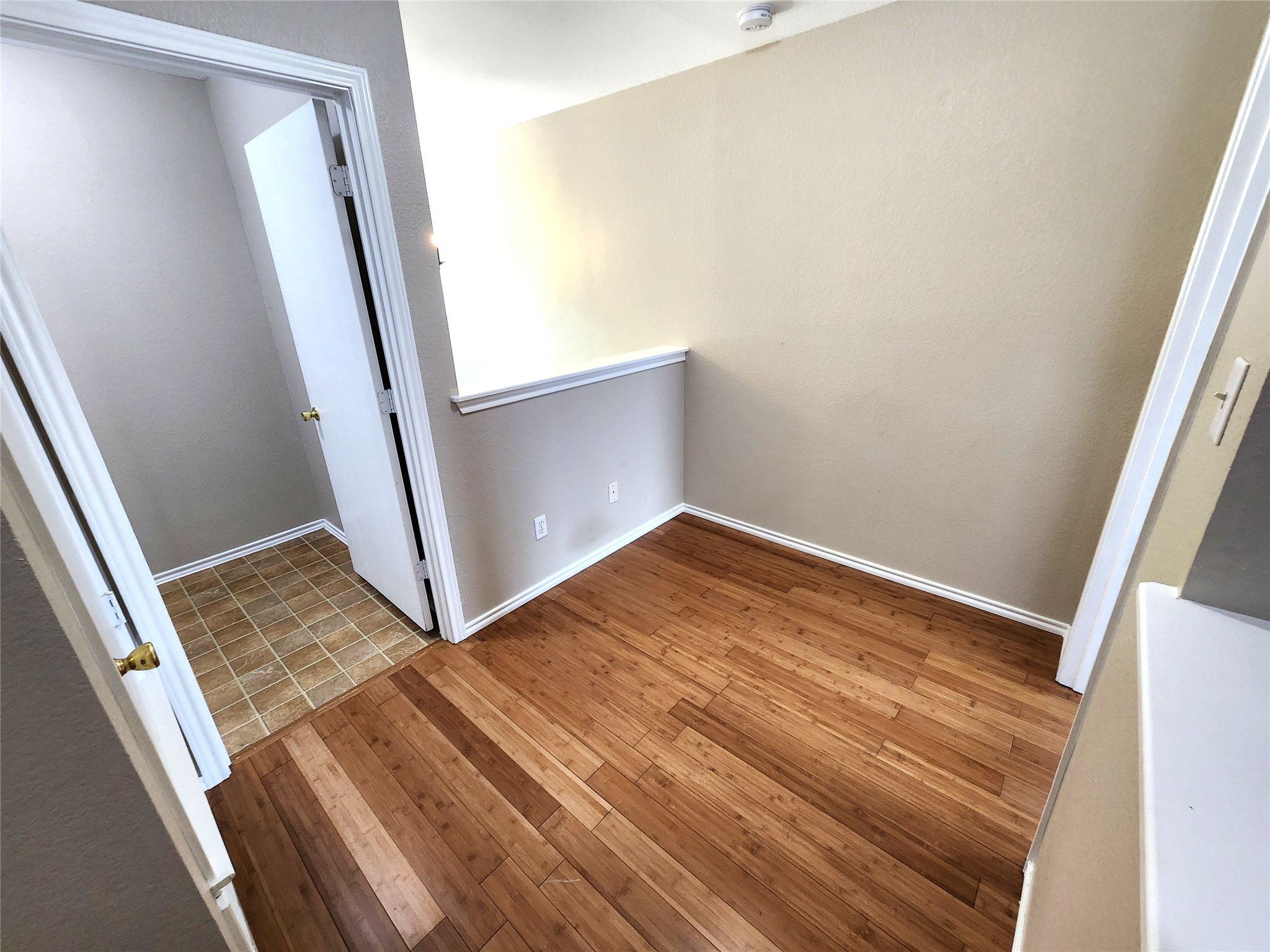 933 Meadow Ridge Loop Georgetown, TX 78626 - Photo 24 of 28 a view of empty room with wooden floor
