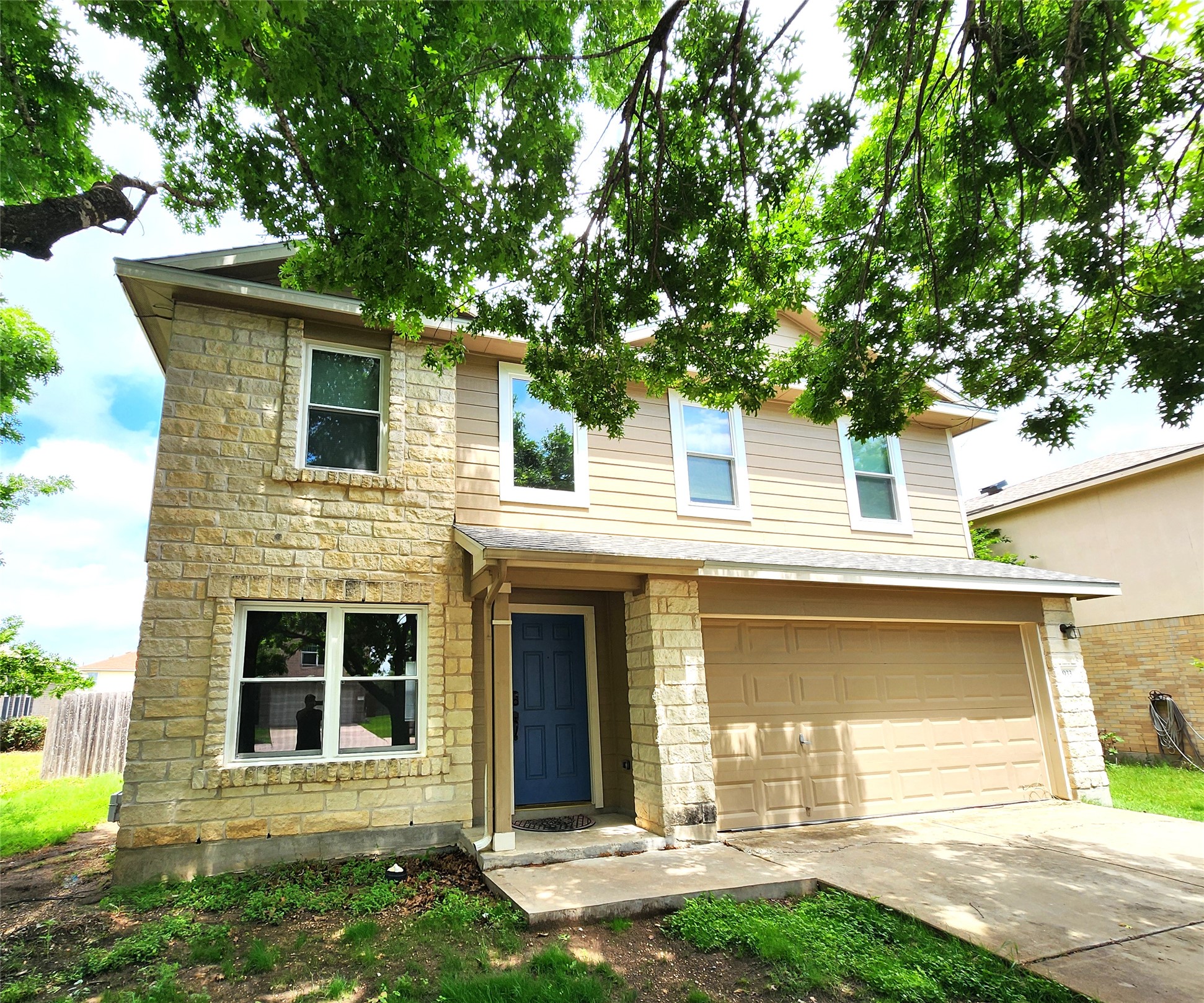 933 Meadow Ridge Loop Georgetown, TX 78626 - Photo 6 of 28 a front view of a house with garden