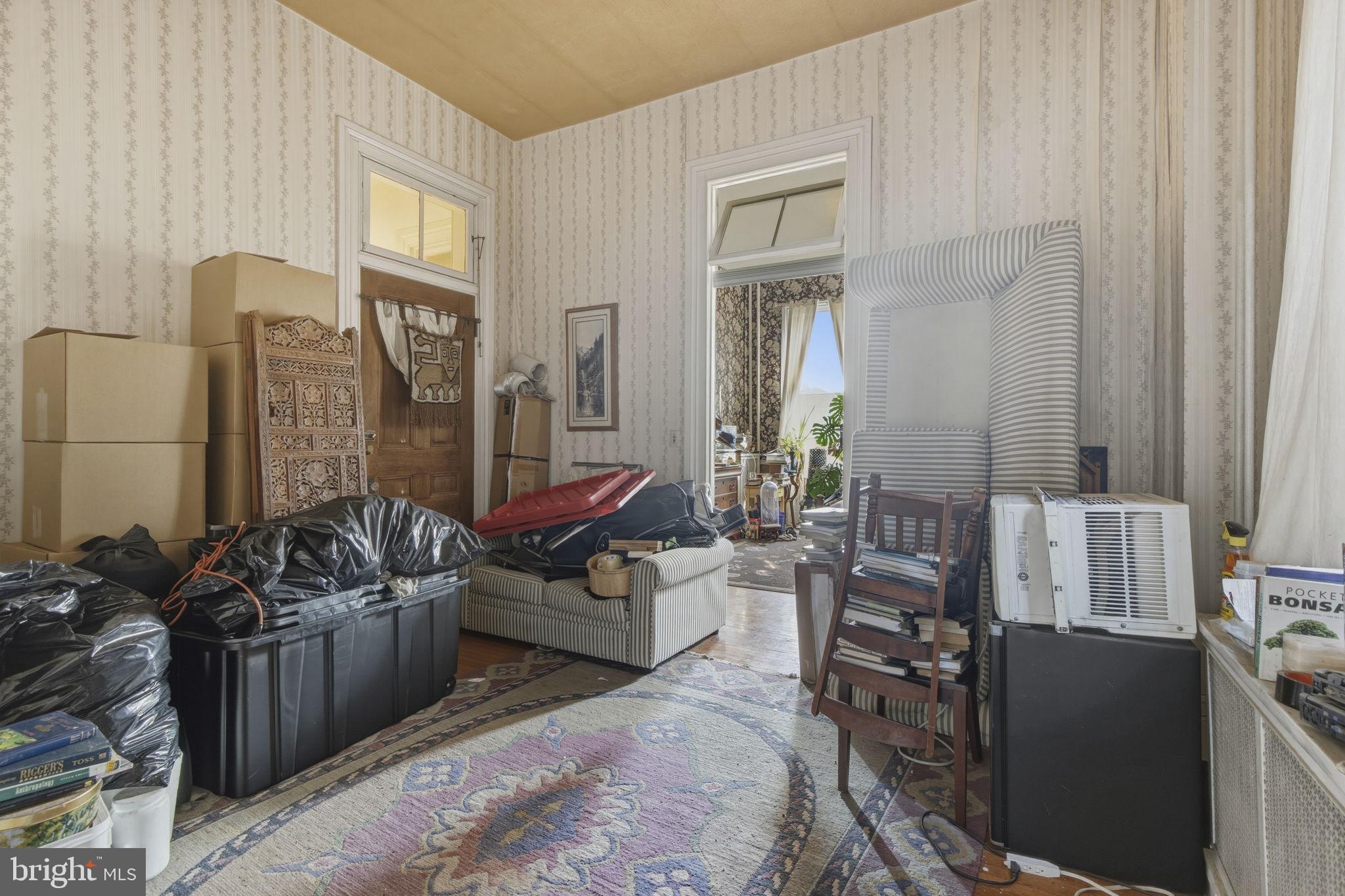 222 West Madison Street Baltimore, MD 21201 - Photo 17 of 40 a living room with furniture windows and a table