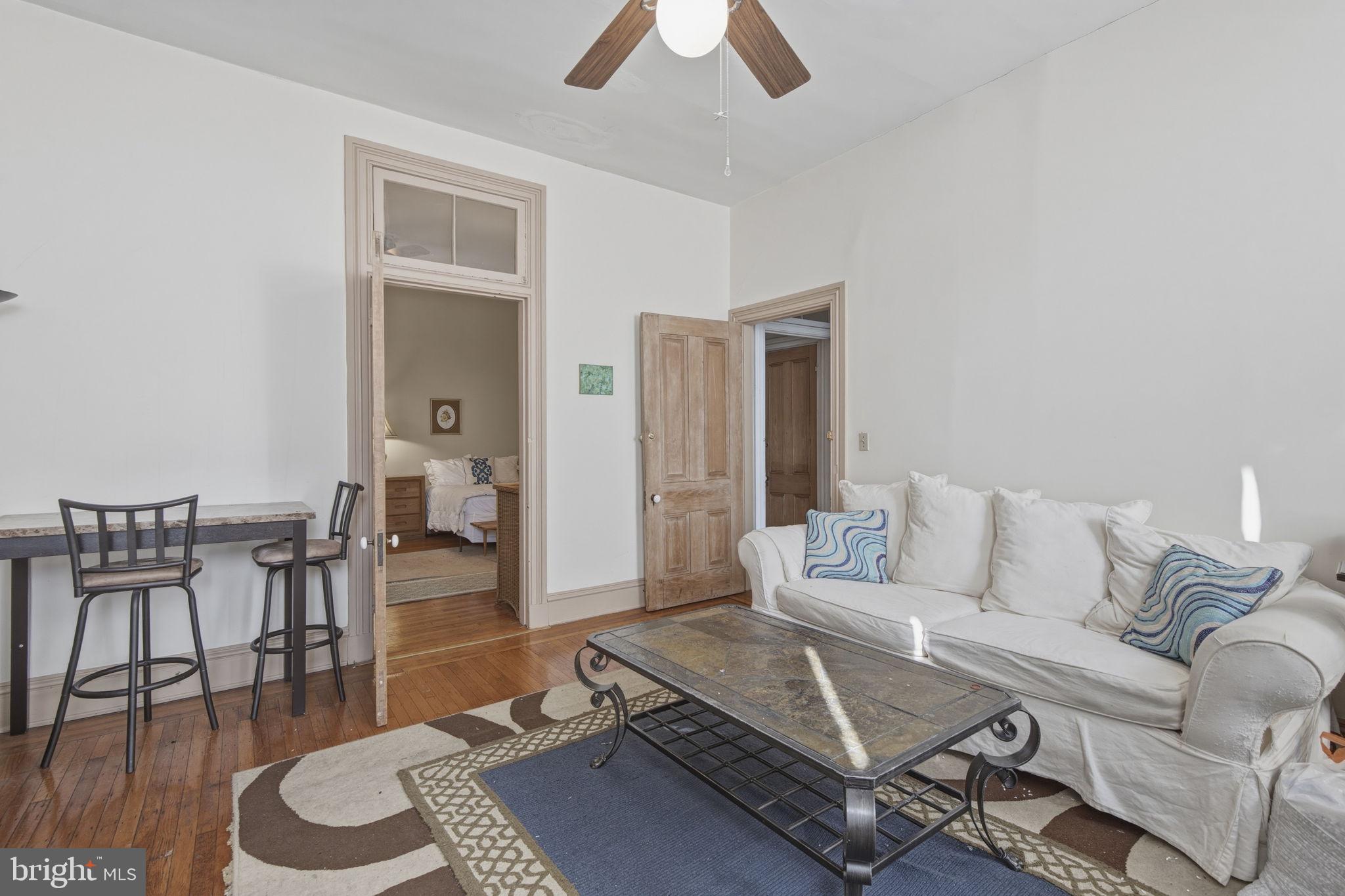 222 West Madison Street Baltimore, MD 21201 - Photo 28 of 40 a living room with furniture and a rug