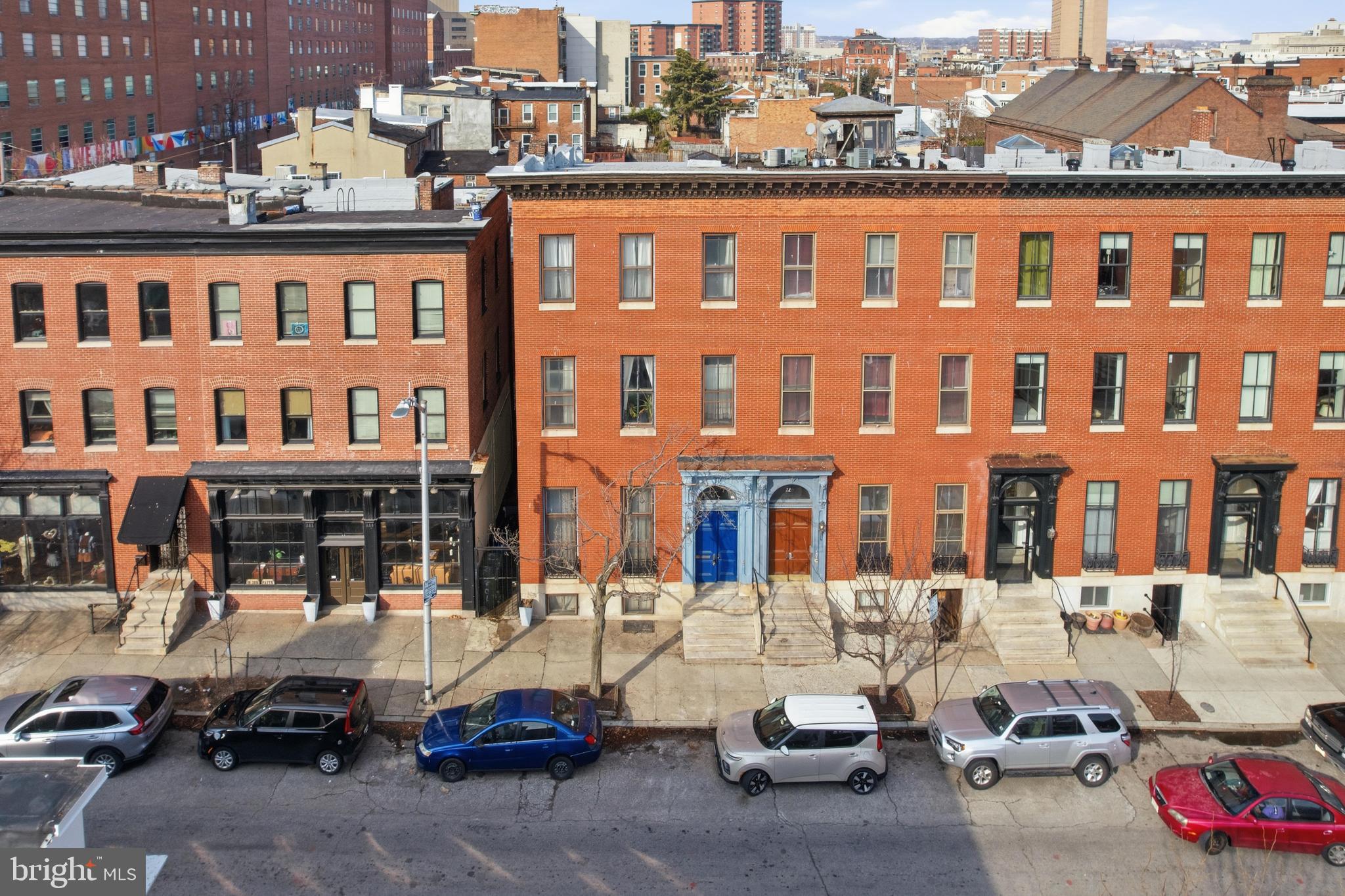 222 West Madison Street Baltimore, MD 21201 - Photo 33 of 40 a city street filled with lots of traffic and tall buildings