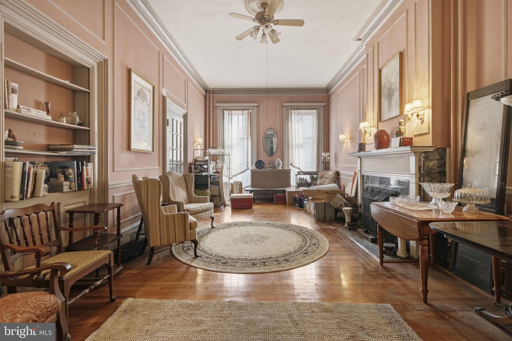 222 West Madison Street Baltimore, MD 21201 - Photo 4 of 40 a living room with furniture and a fireplace
