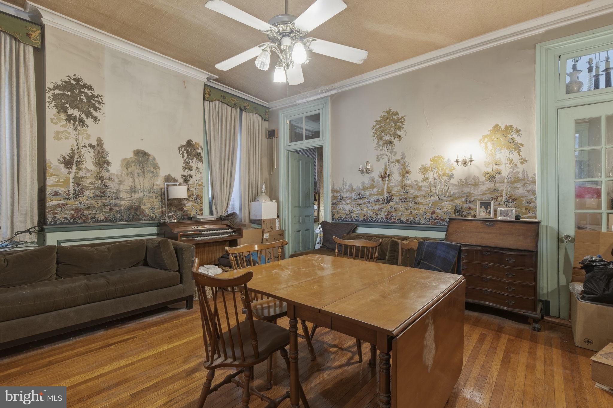 222 West Madison Street Baltimore, MD 21201 - Photo 6 of 40 a view of a dining room with furniture window and wooden floor