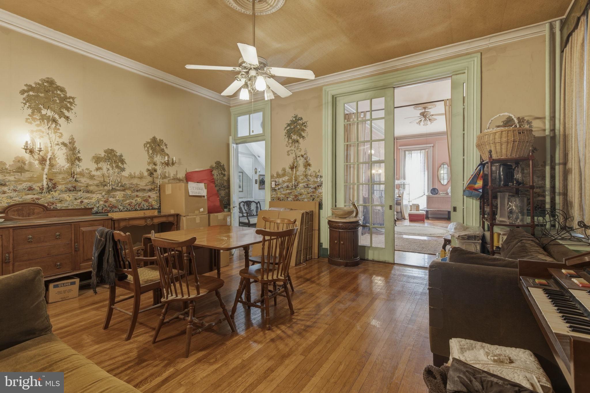 222 West Madison Street Baltimore, MD 21201 - Photo 7 of 40 a view of a dining room with furniture window and wooden floor
