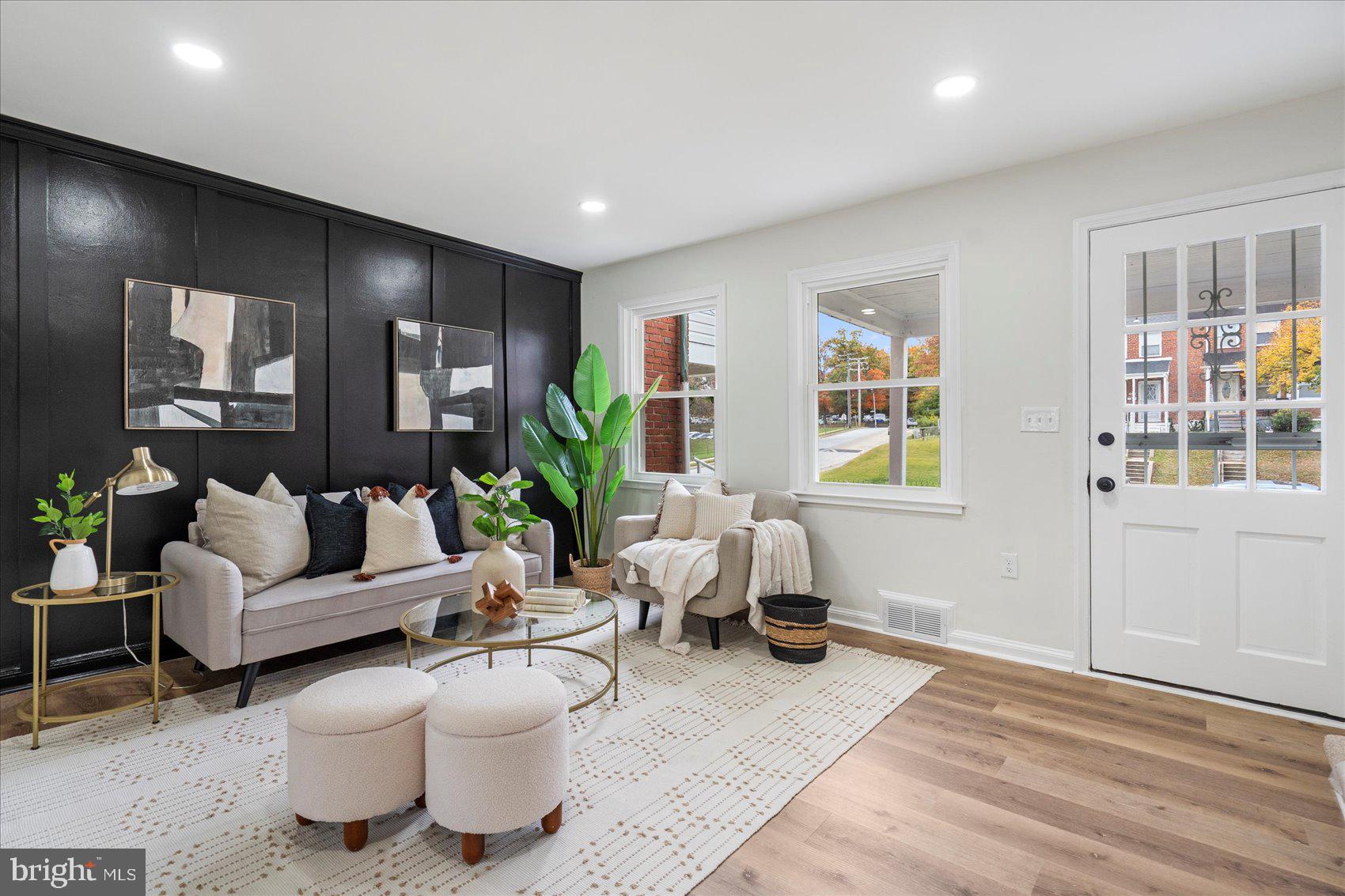 1656 Ramblewood Road Baltimore, MD 21239 - Photo 4 of 40 a living room with furniture and windows