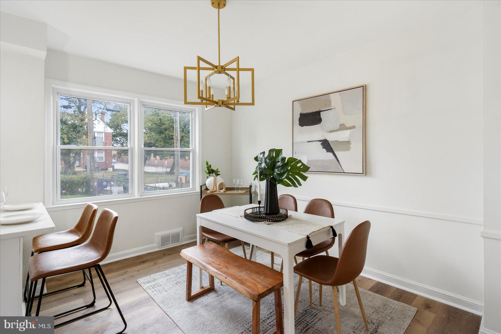 1656 Ramblewood Road Baltimore, MD 21239 - Photo 10 of 40 a dining room with furniture and window