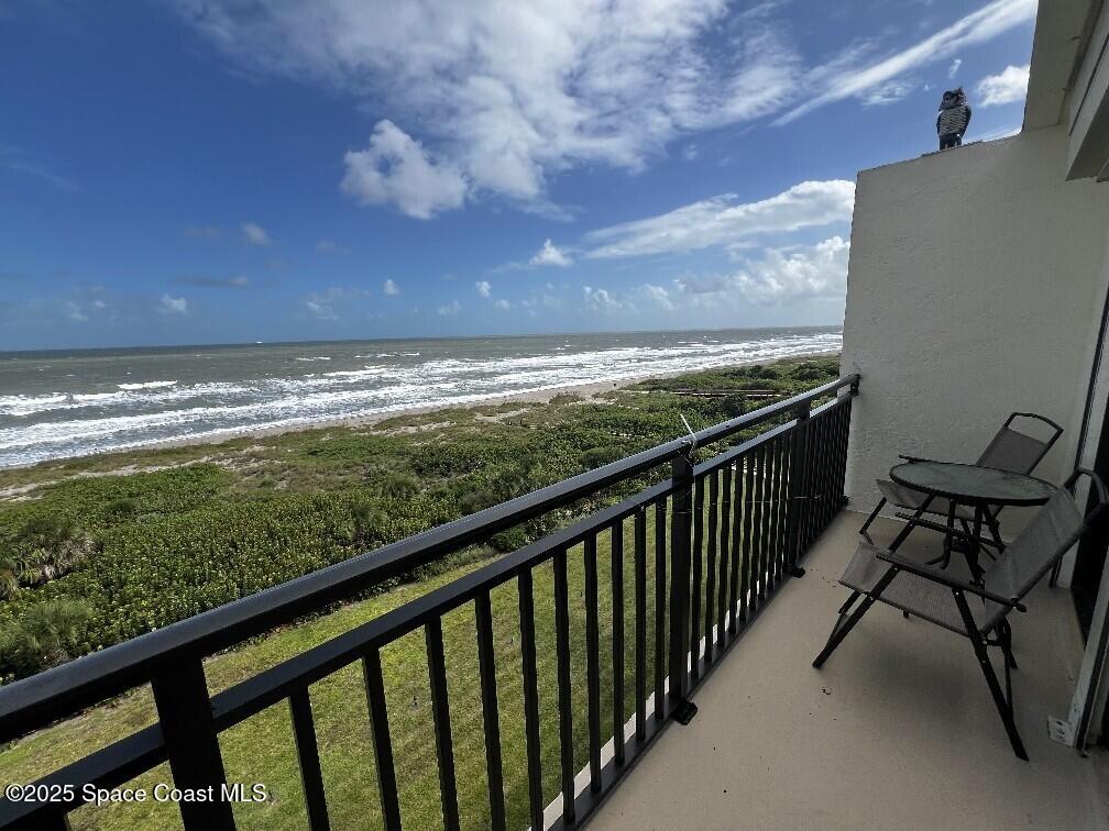 3060 North Atlantic Avenue, Unit 701 Cocoa Beach, FL 32931 - Photo 23 of 25 a view of a balcony with an outdoor space