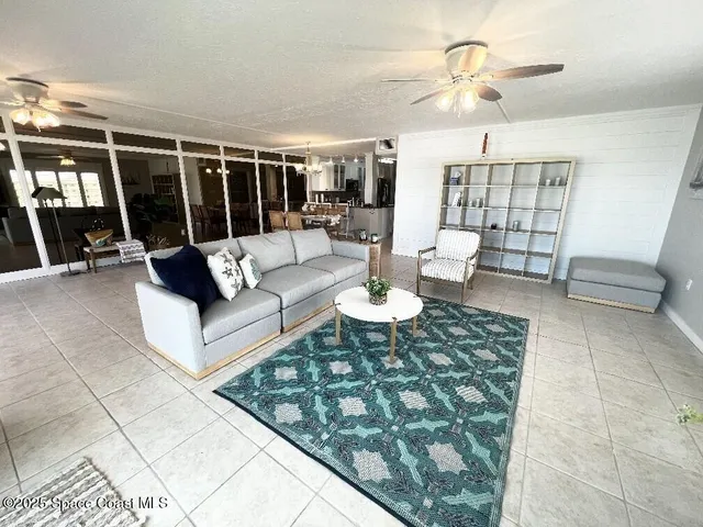 a living room with furniture and rug