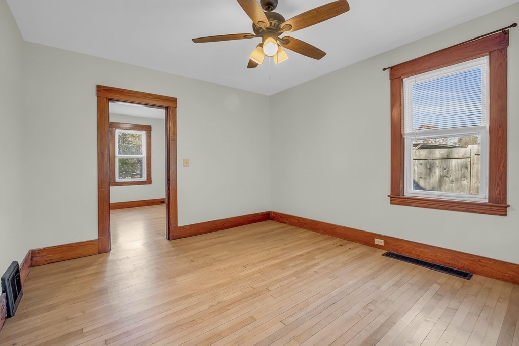 233 Petersham Road Athol, MA 01331 - Photo 15 of 31 a view of an empty room with window and wooden floor