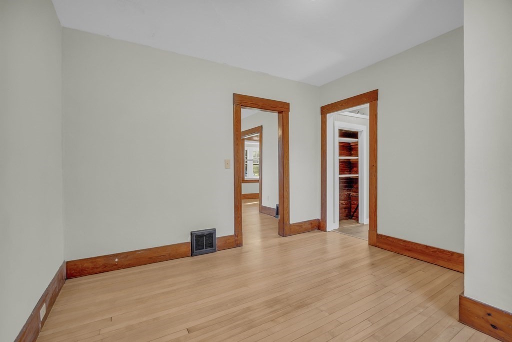233 Petersham Road Athol, MA 01331 - Photo 17 of 31 a view of an empty room with wooden floor and closet