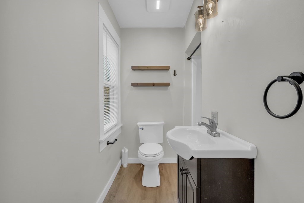 233 Petersham Road Athol, MA 01331 - Photo 20 of 31 a bathroom with a toilet sink and mirror