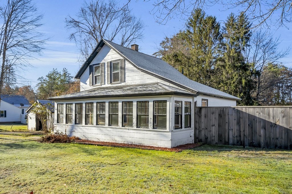233 Petersham Road Athol, MA 01331 - Photo 2 of 31 a view of a house with a yard and wooden fence