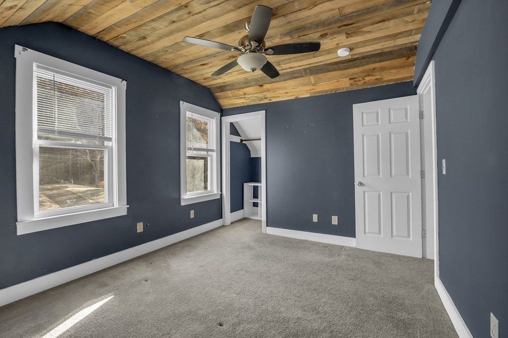 233 Petersham Road Athol, MA 01331 - Photo 22 of 31 a view of an empty room with a window