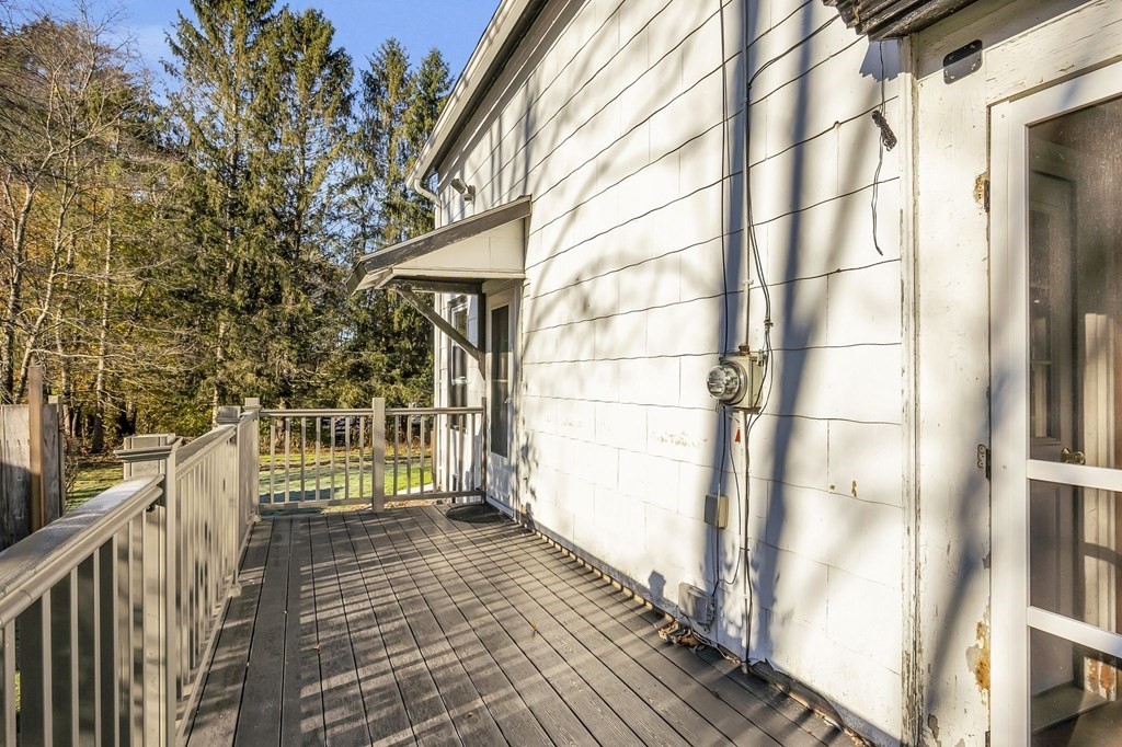 233 Petersham Road Athol, MA 01331 - Photo 27 of 31 a view of a balcony with wooden floor and fence