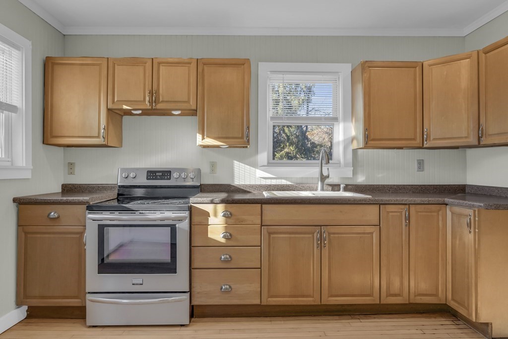 233 Petersham Road Athol, MA 01331 - Photo 8 of 31 a kitchen with granite countertop a sink stainless steel appliances and cabinets