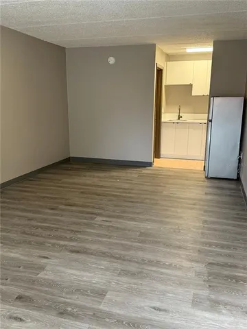 a bathroom with a toilet and a bathtub