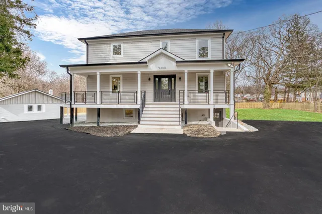 front view of a house with a street