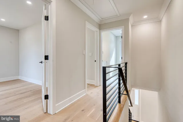 a view of a hallway with closet and entryway