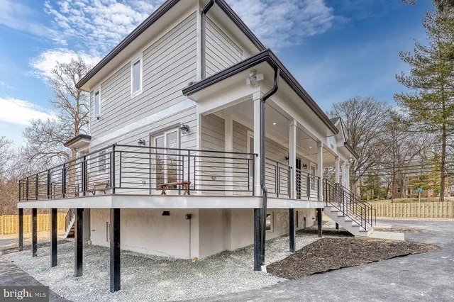 a view of a house with a roof deck