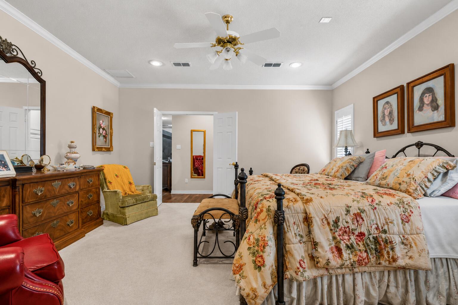 7402 95th Street Lubbock, TX 79424 - Photo 20 of 43 a bed room with a bed and a chair