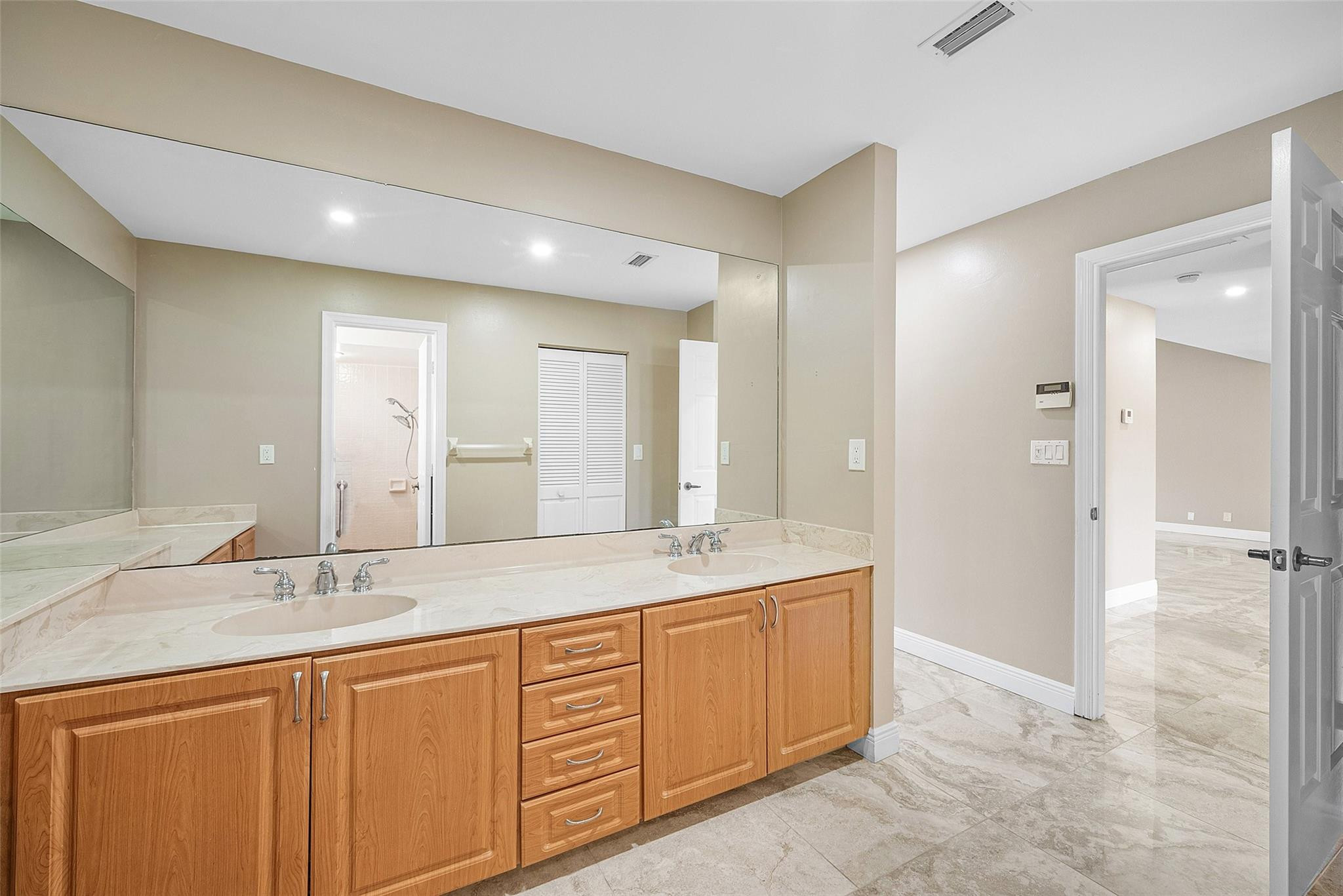 6191 Petaluma Drive Boca Raton, FL 33433 - Photo 25 of 36 a bathroom with a granite countertop sink mirror and double