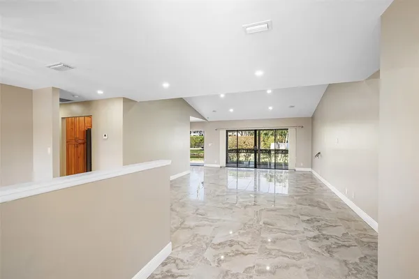 a view of an empty room and window