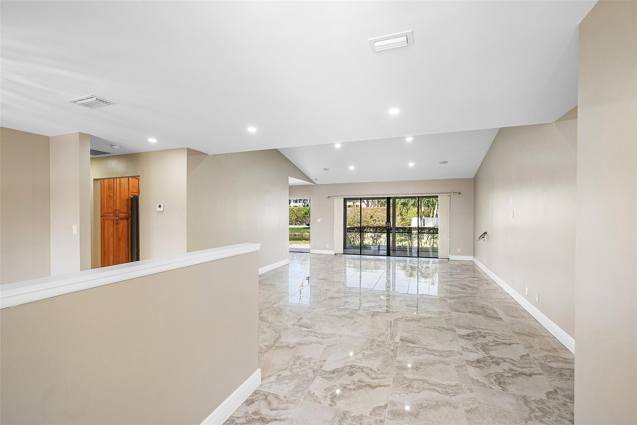 6191 Petaluma Drive Boca Raton, FL 33433 - Photo 5 of 36 a view of an empty room and window