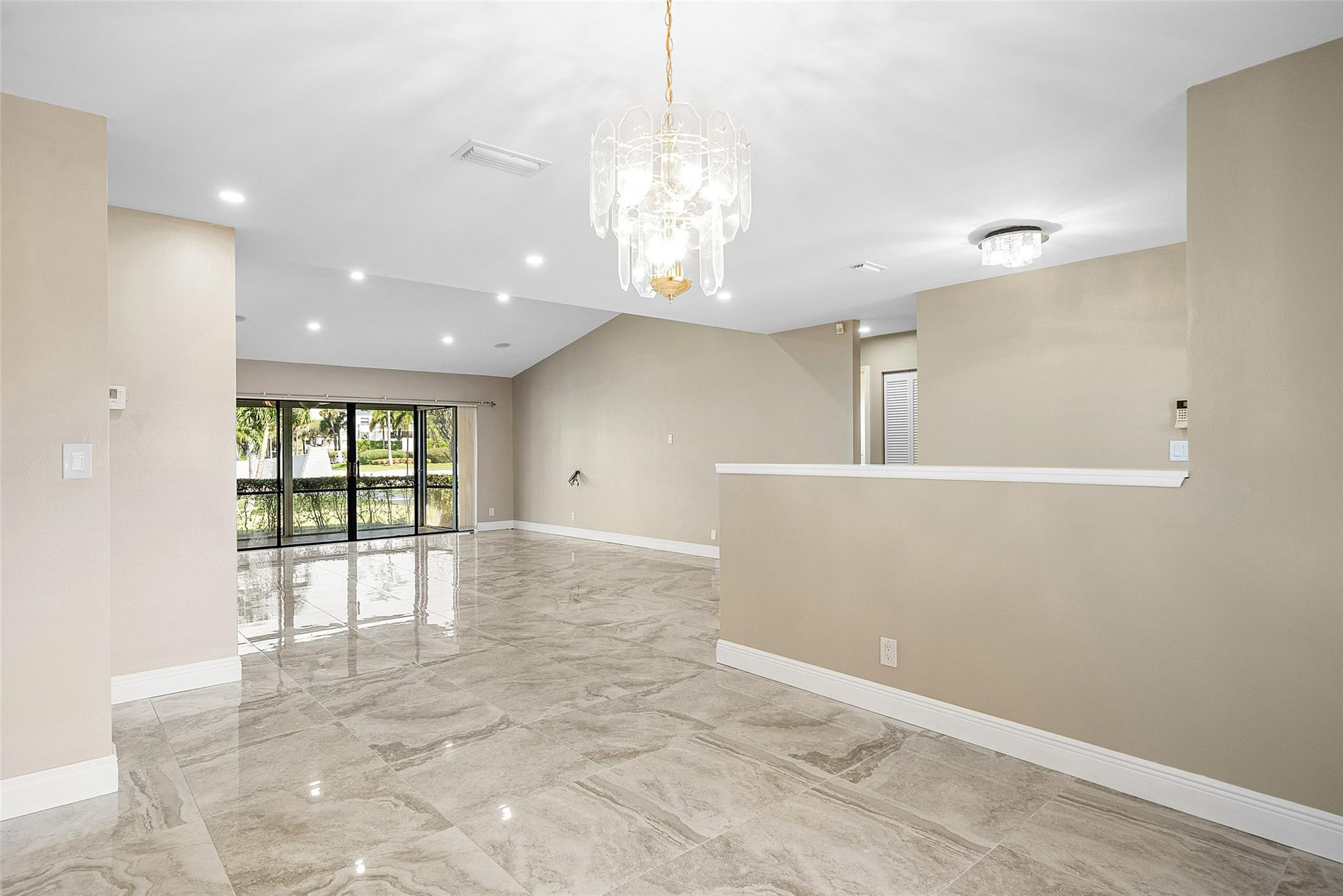 6191 Petaluma Drive Boca Raton, FL 33433 - Photo 8 of 36 a view of an empty room with a window
