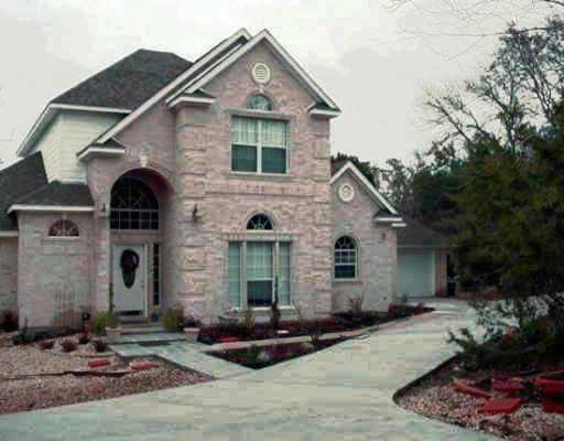 2804 Wren Road Manchaca, TX 78652 - Photo 1 of 1 a front view of a house with a yard