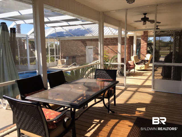 16872 County Road 12 South Foley, AL 36535 - Photo 21 of 35 This portion of the lanai is accessible via french doors from the master suite