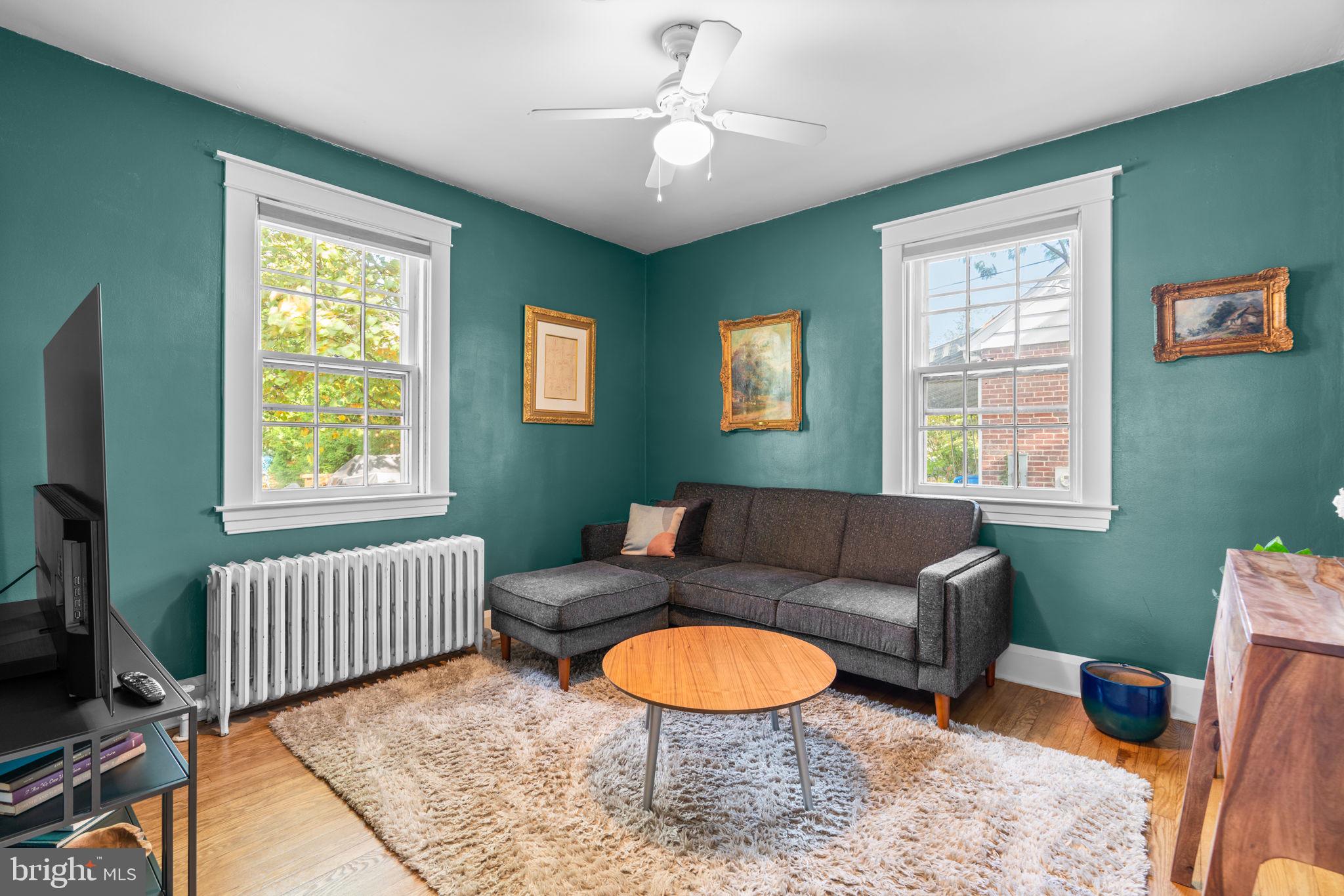 664 Regester Avenue Baltimore, MD 21212 - Photo 12 of 42 a living room with furniture and a window