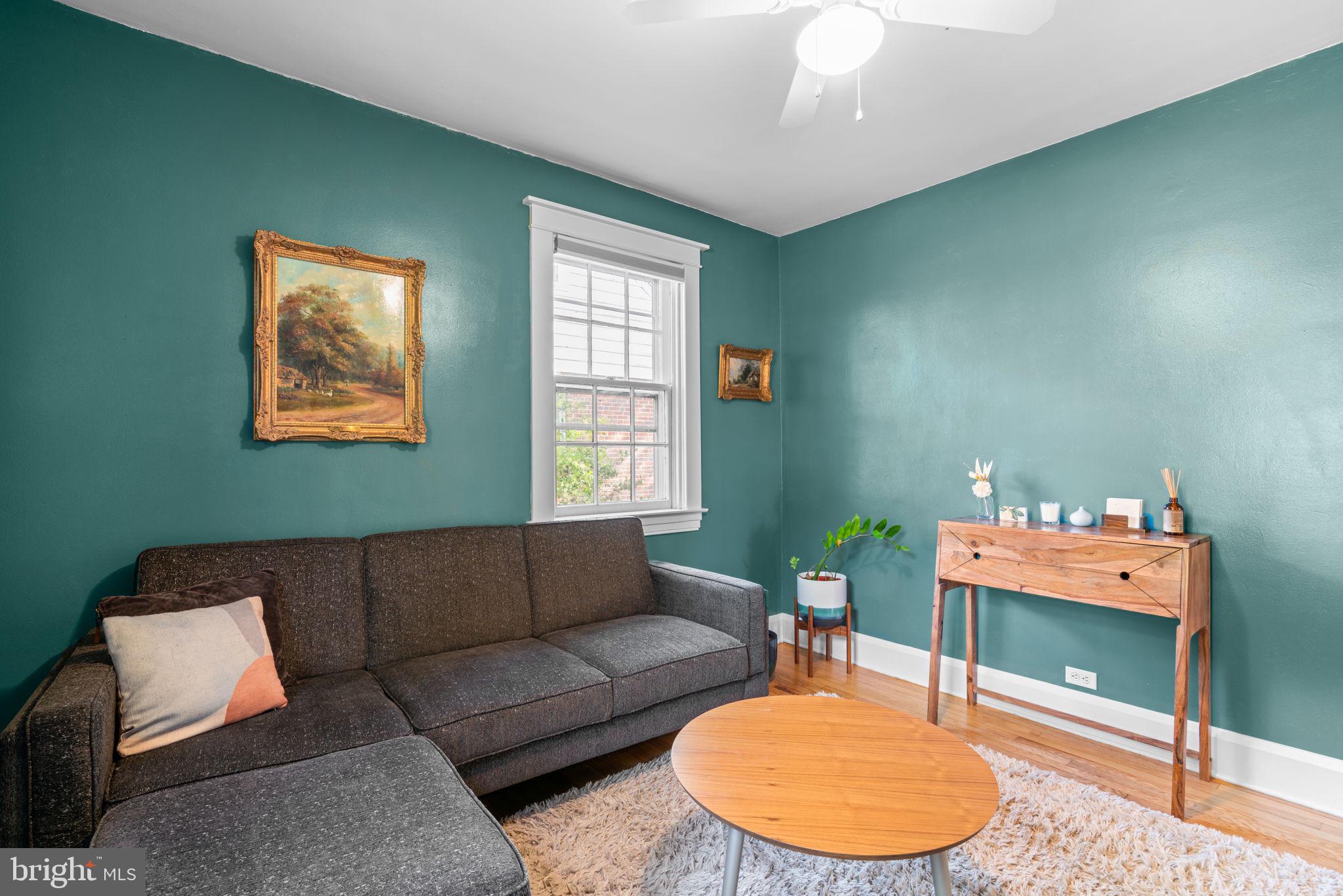 664 Regester Avenue Baltimore, MD 21212 - Photo 13 of 42 a living room with furniture and a window